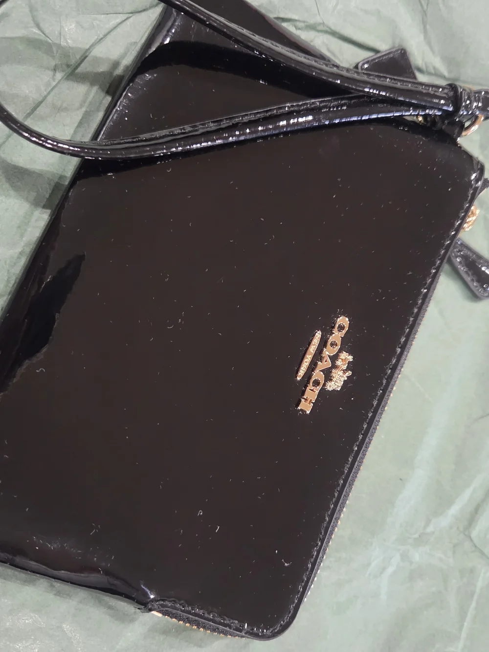 Coach sleek black